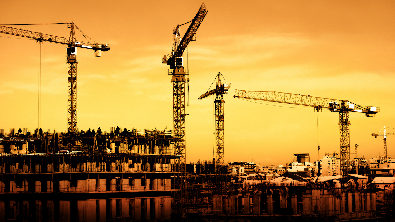 Cranes on a construction site (image: dreamstime_Cornelius20)
