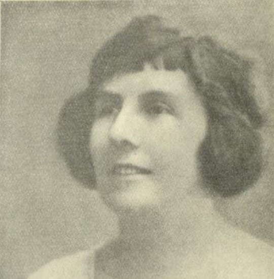 Black and white mugshot of a woman